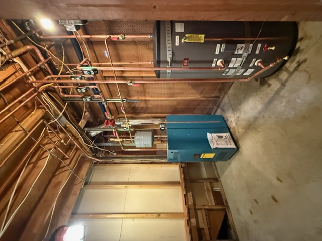 Basement boiler and water heater installation by Aaron's Plumbing & Heating